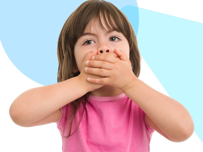 A child covering their mouth.