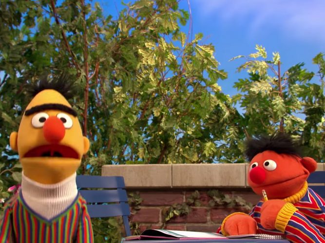 Bert and Ernie at a park