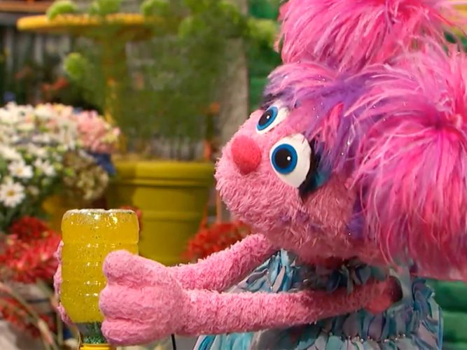 Abby Cadabby playing with a glitter jar.