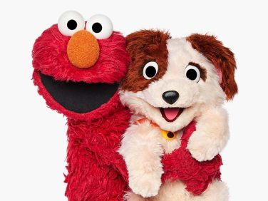 Elmo hugging Tango