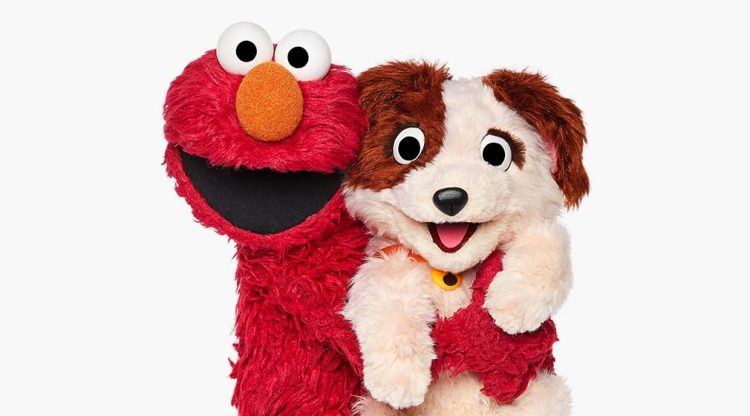 Elmo hugging Tango