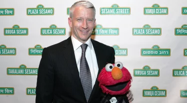 Anderson Cooper and Elmo.