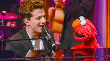 Charlie Puth singing with Elmo.