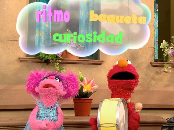 Abby and Elmo looking at words above them: ritmo, baqueta, curiosidad.