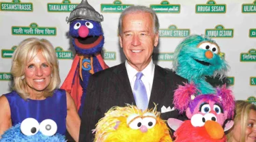 President Joe Biden, Dr. Jill Biden and the Muppets of Sesame Street.