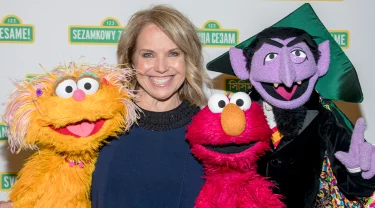 Katie Couric with Zoe, Elmo and the Count.