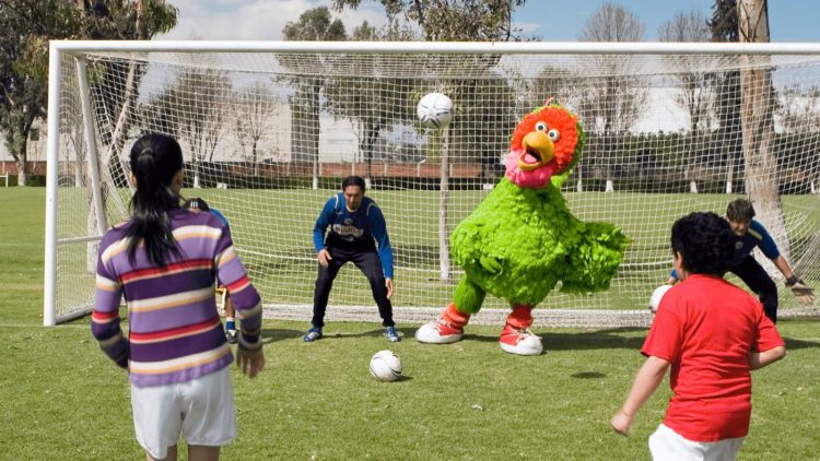 Abelerdo playing soccer.