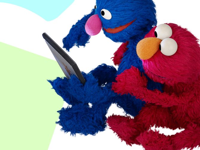 Elmo and Grover on a tablet.