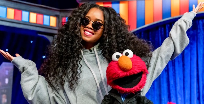 Elmo with Her.