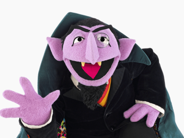 The Count waving.