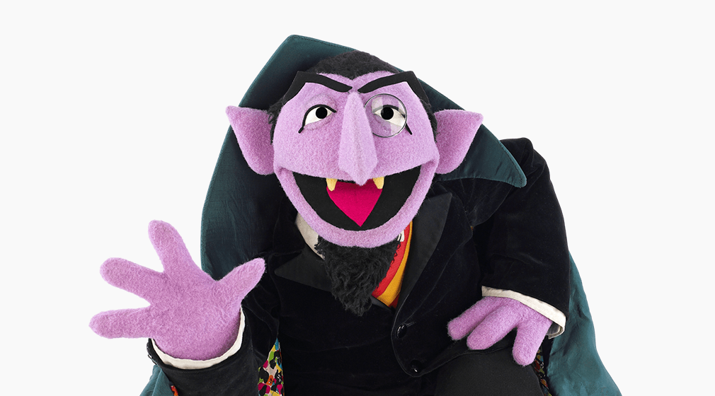 The Count waving.