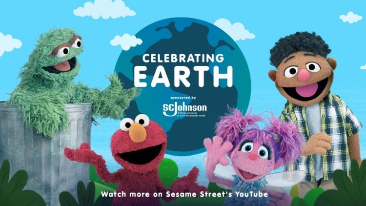 Oscar, Elmo, Abby, Tamir celebrating earth.