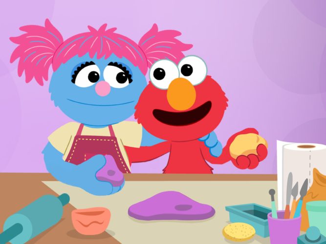 Jesse and Elmo play with clay