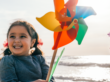 Basma and a child on the beach.