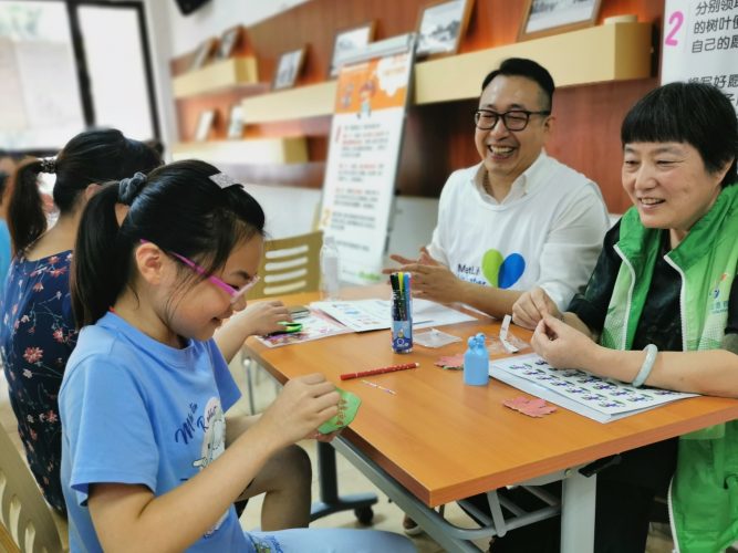 Children and providers in a classroom.