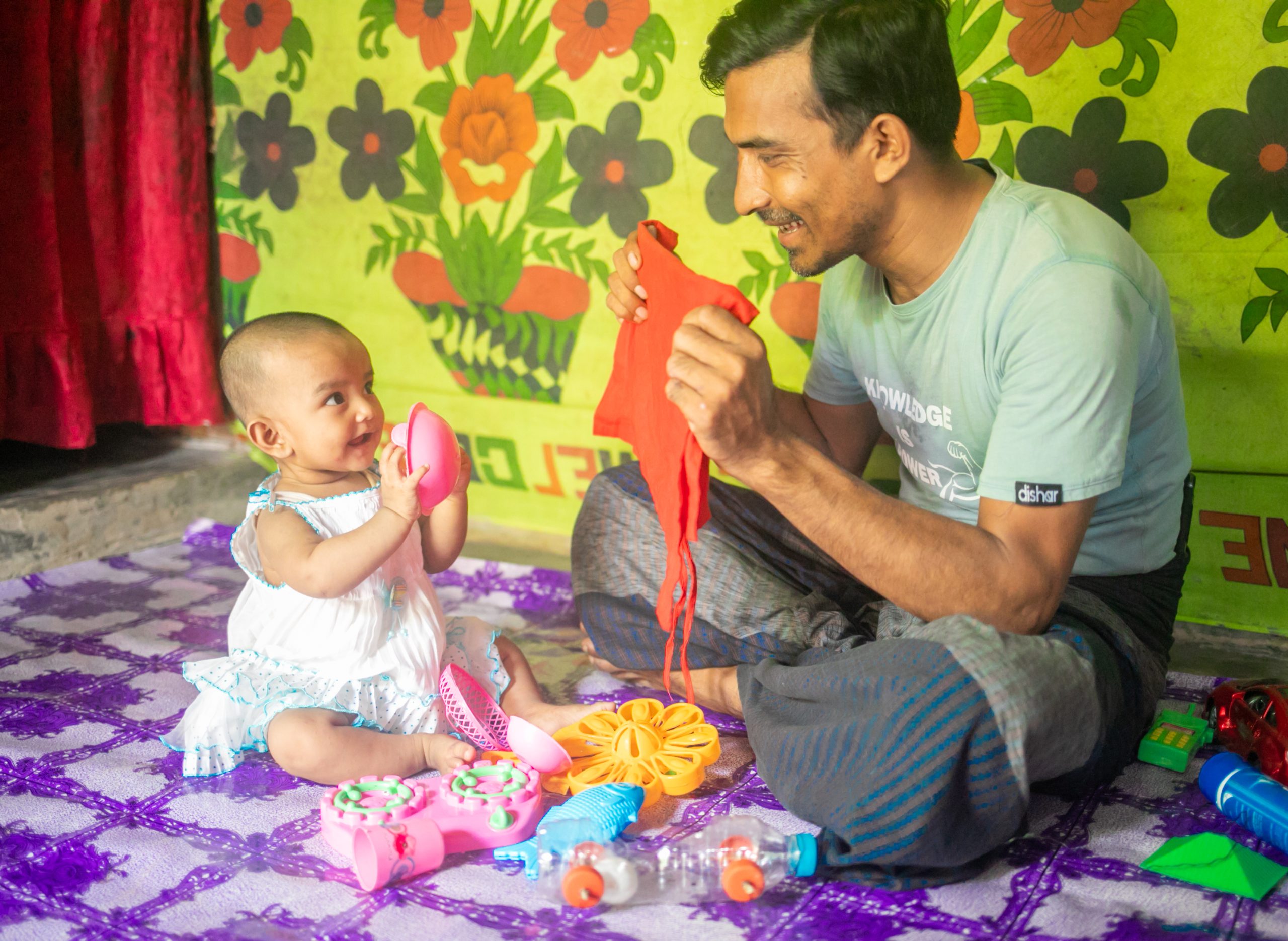 Father Playing with his baby.