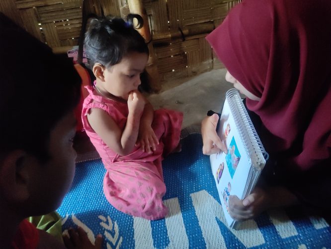 teacher reading to a child.