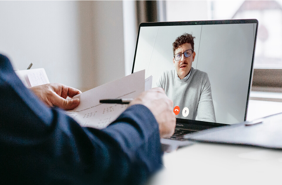 A man is having a video conference