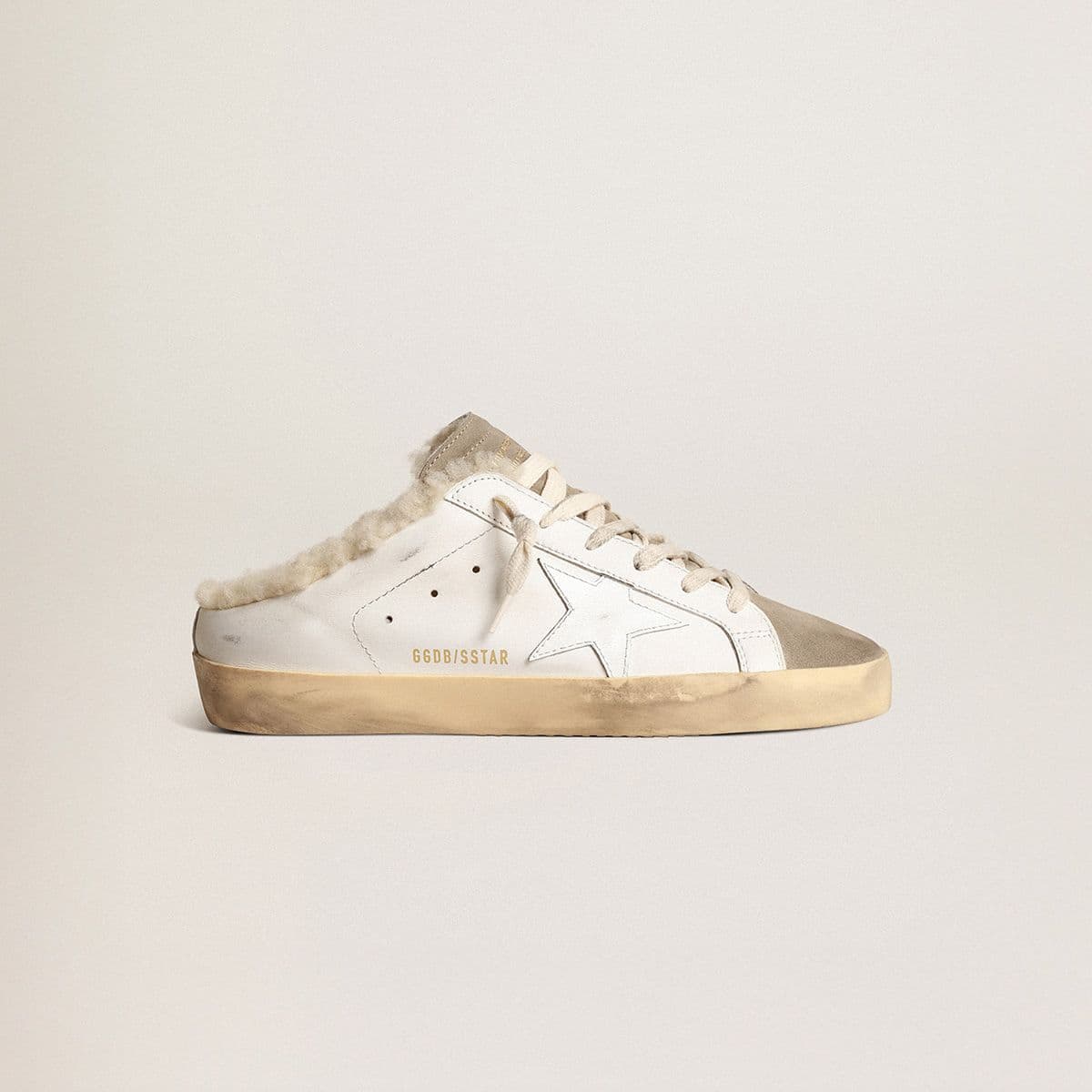 Super-Star-Sabots-with-white-leather-star-and-shearling-lining