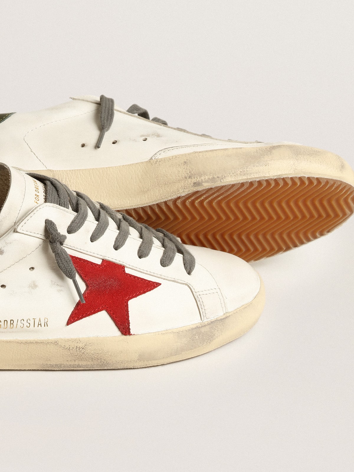 Golden Goose - Men's Super-Star with red suede star and green leather heel tab in 