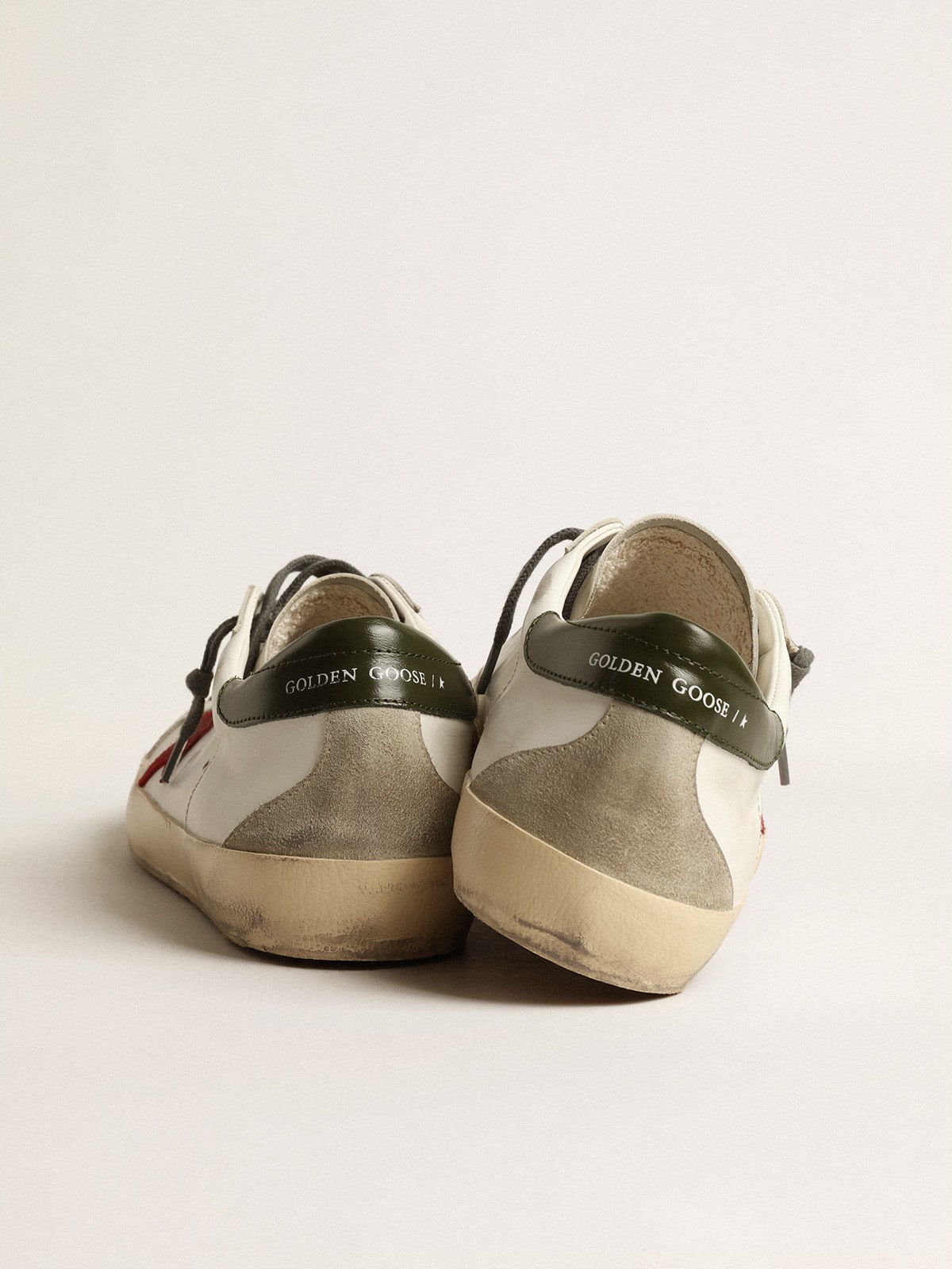 Golden Goose - Men's Super-Star with red suede star and green leather heel tab in 