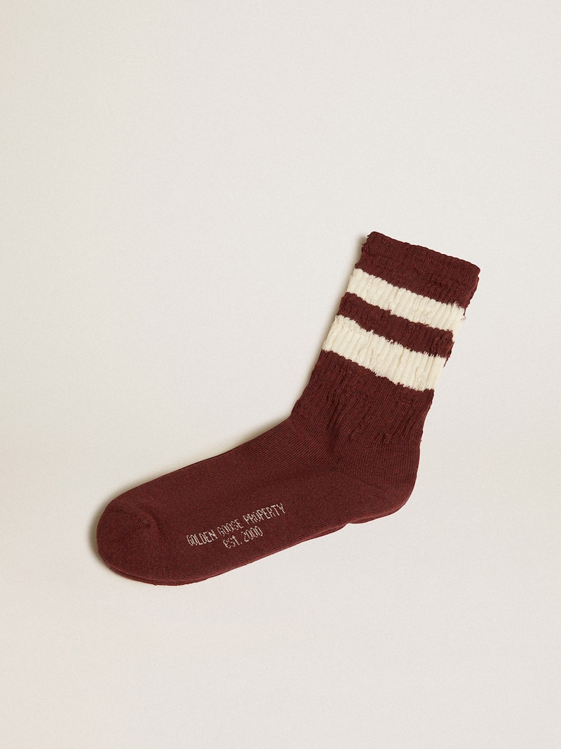 Brown socks with distressed details and worn-white stripes