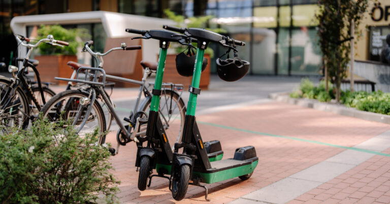 Two parked Bolt scooters