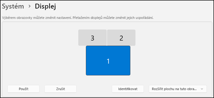 Zobrazuje část obrazovky Displej, která označuje uspořádání monitorů. Text který říká, že můžete vybrat monitor a změnit jeho nastavení, nebo je můžete uspořádat přetažením displejů.