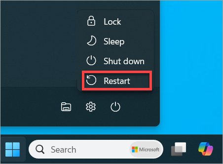 Finding the Restart option in Windows 11.