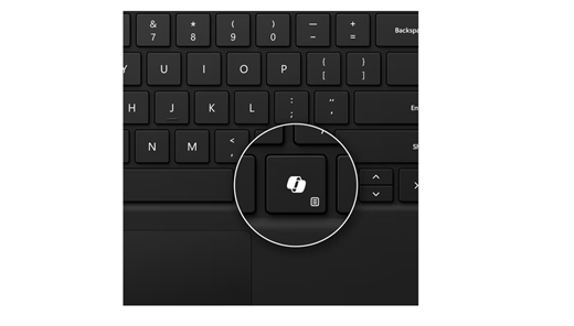 Skjermbilde av Copilot-tasten på det svarte Surface Pro-tastaturet for bedrifter.