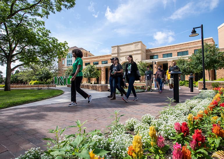 A campus tour group being guided around University of North Texas. 