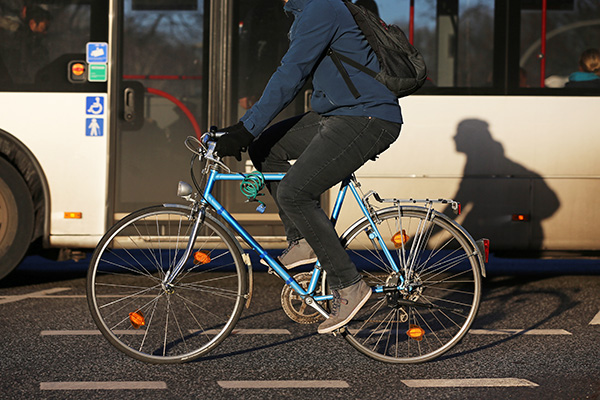 biker with bus