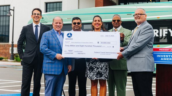 Federal Transit Administration's Acting Administrator Veronica Vanterpool presents a $30.8 million grant to Detroit Department of Transportation on behalf of the Biden administration.