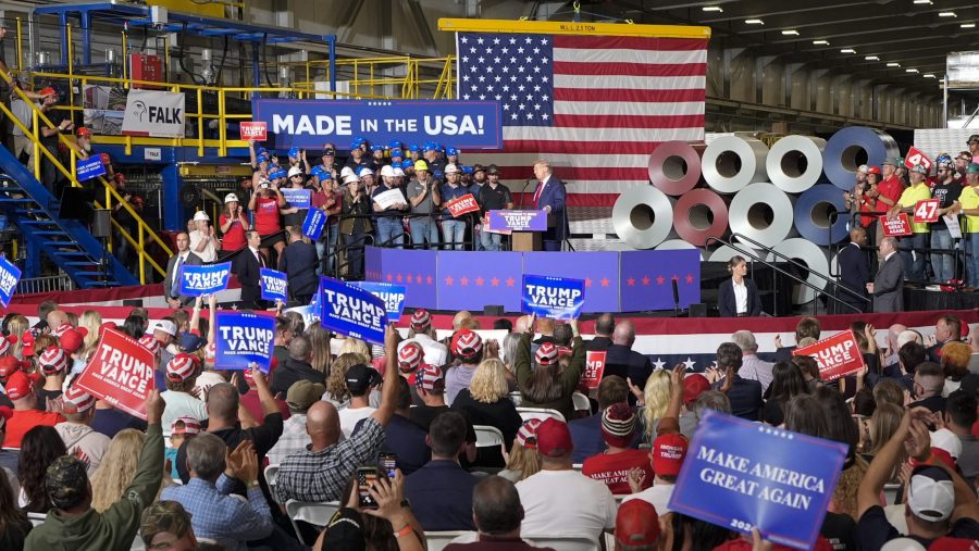 Republican presidential nominee former President Donald Trump speaks at a campaign event, Friday, Sept. 27, 2024 in Walker, Mich.