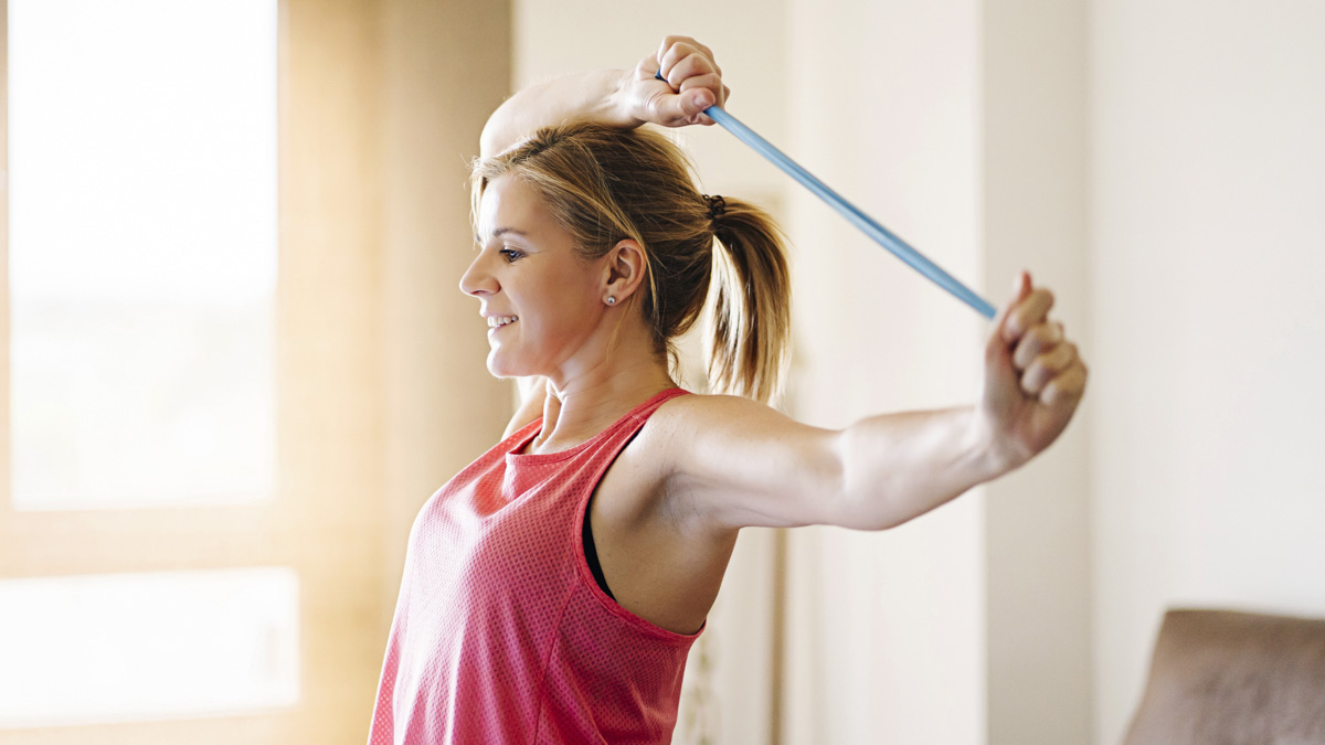 Image Of An Athletic Woman Using Mobility Tools To Release Muscle Tension