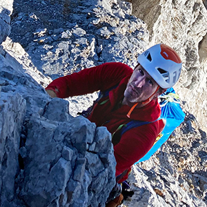 Climber On A Steep Rock Face