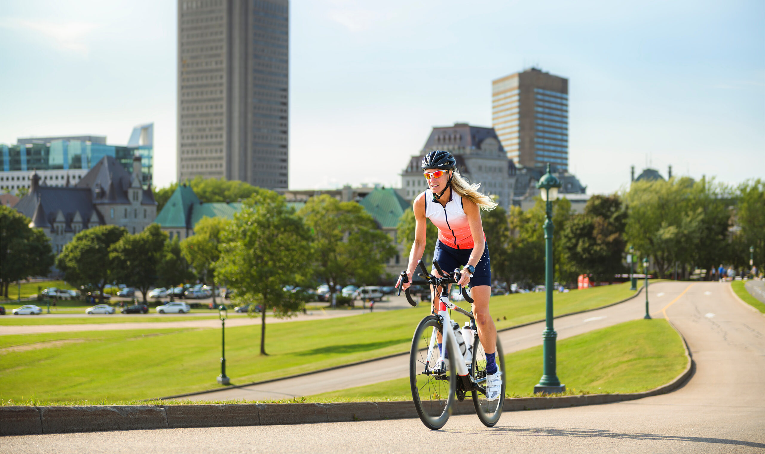 Professional Female Cyclist In Protective Gear Outdoors On A Daytime