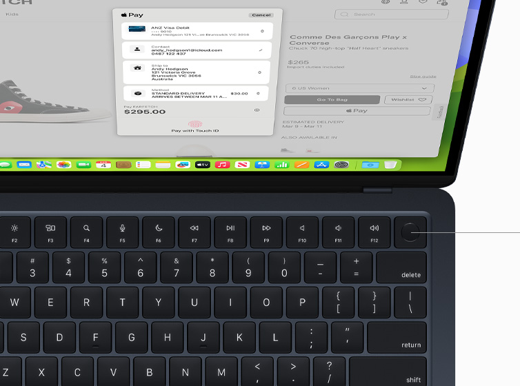 Top view of MacBook Air showcasing Touch ID and Magic Keyboard working with Apple Pay