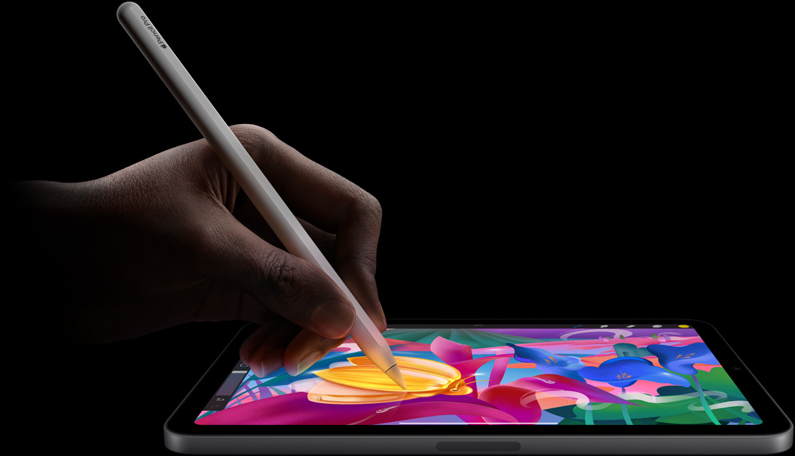 Una mano crea coloridas ilustraciones con un Apple Pencil Pro en un iPad mini.