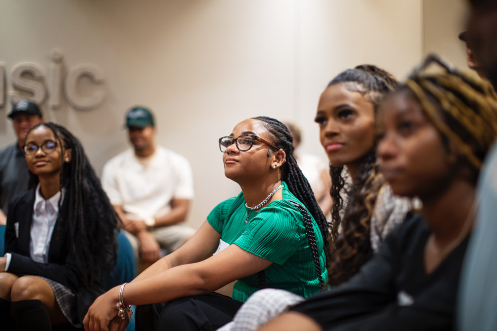 Students sit in the Spatial Audio room at Apple Music Nashville.