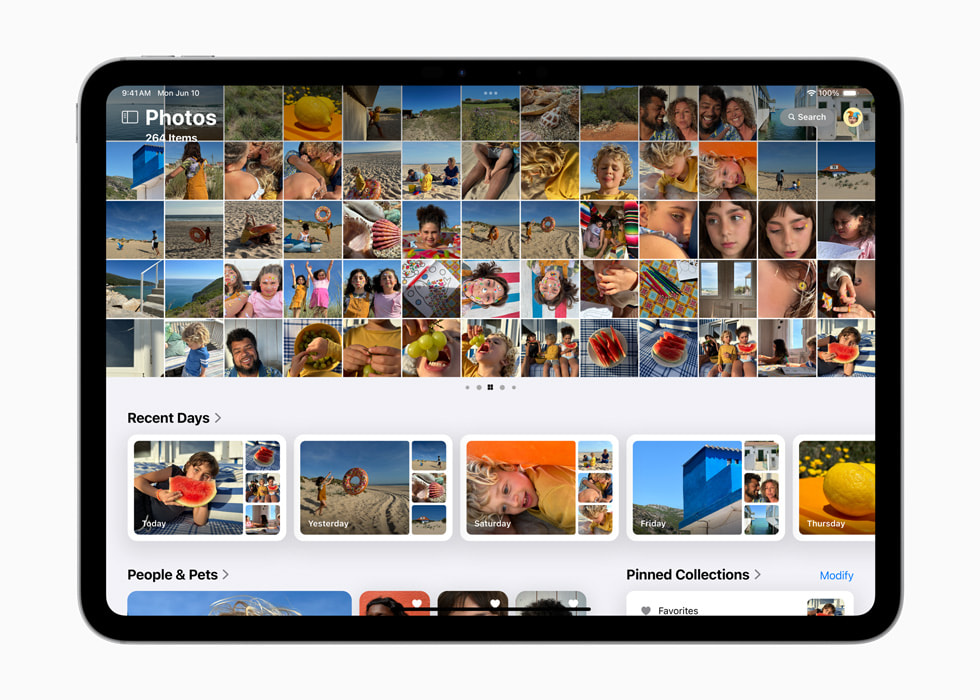 写真のグリッド、Recent DaysとPeople & Petのコレクション、Pinned Collectionsを表示しているiPad Pro. 