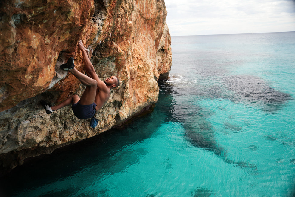 Kai Lightner scales a seaside crag in the “Deep Water Solo” episode of “Adventure.”