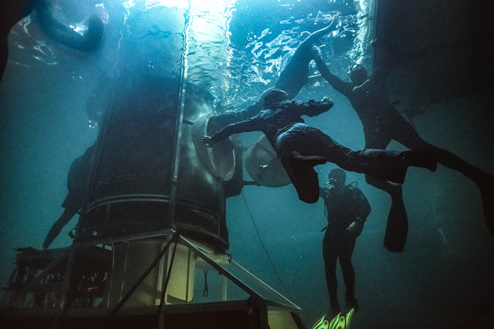 A behind-the-scenes shot of underwater filming on the set of “Submerged.”