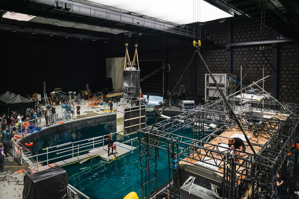 A set from “Submerged,” featuring a large tank of water and production gear.