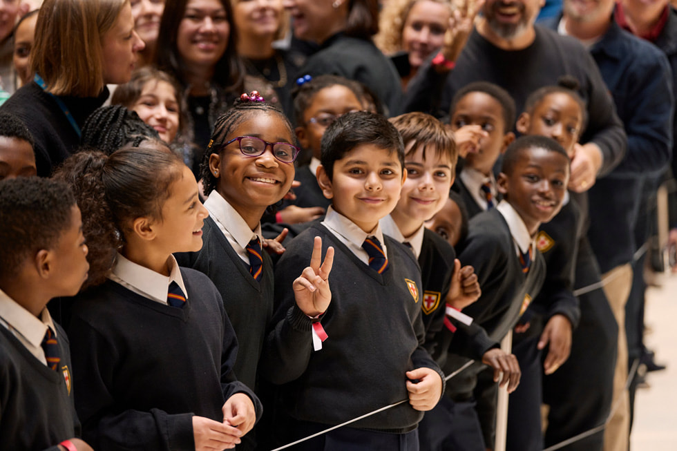 Students from St. George’s Primary School smile and pose during their visit to Battersea Power Station.