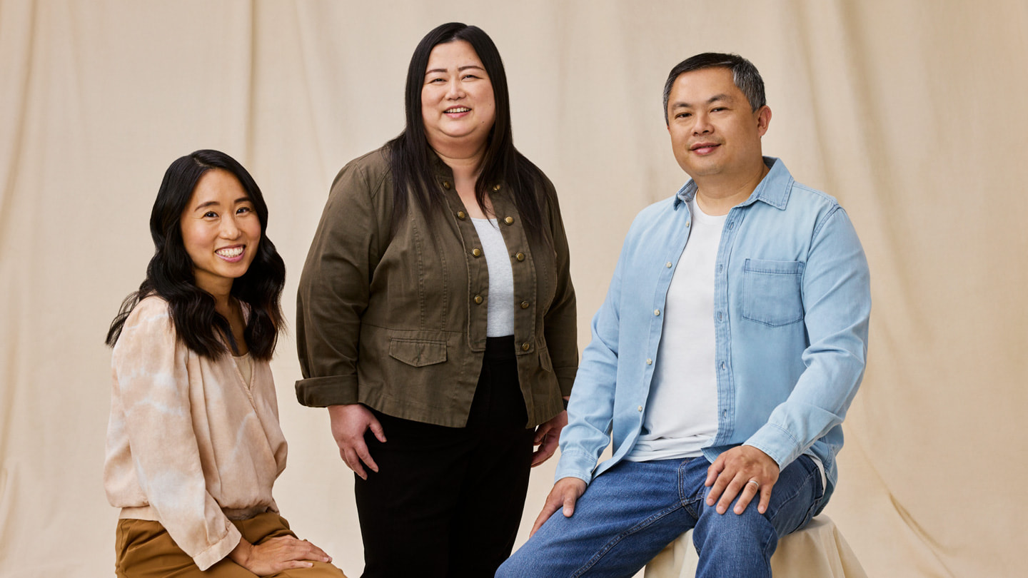 App creators Dawoon Kang, Annie Vang, and Larry Liu pose together.