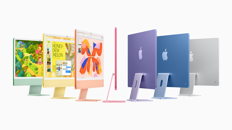 绿色、黄色、橙色、粉色、紫色、蓝色和银色的新款 iMac。