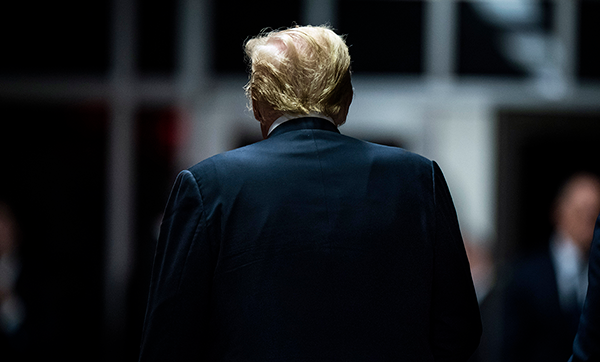 Former US President and Republican presidential candidate Donald Trump departs after speaking to the media at the end of the day's proceedings during his criminal trial at Manhattan Criminal Court in New York City, on May 29, 2024.