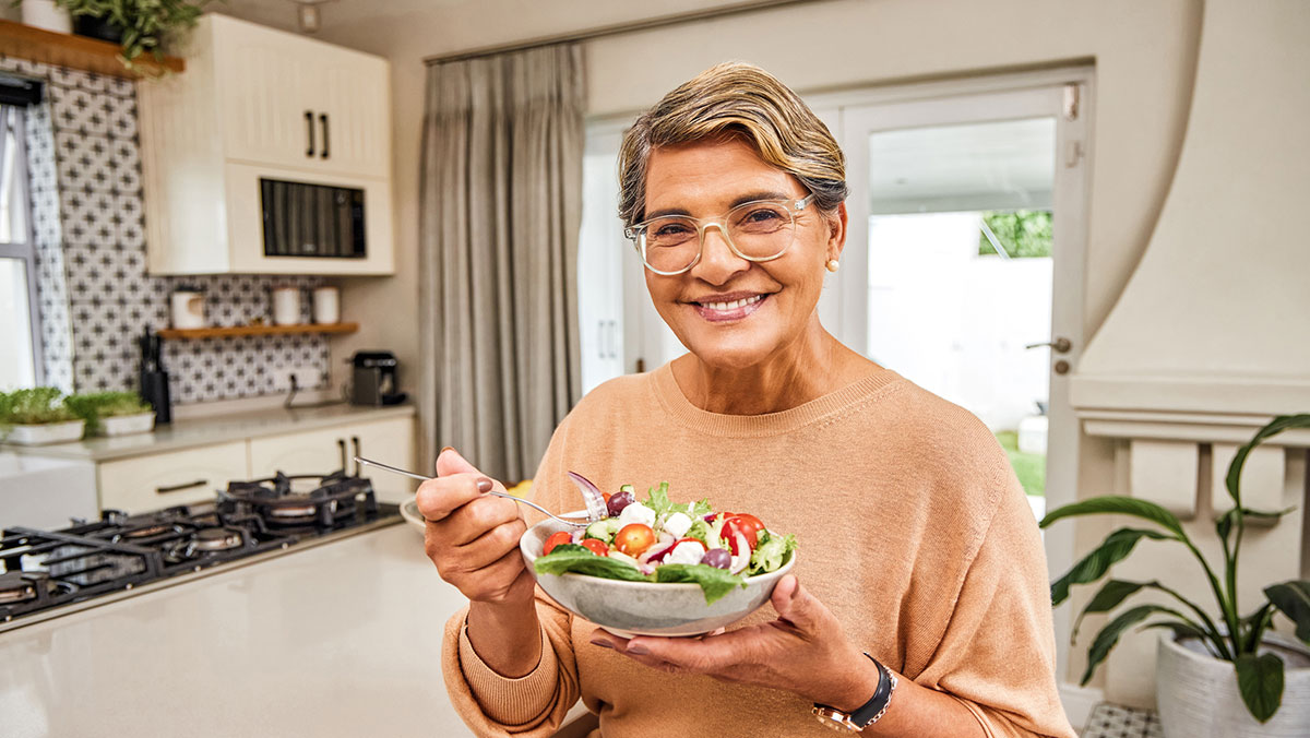 woman eating salad