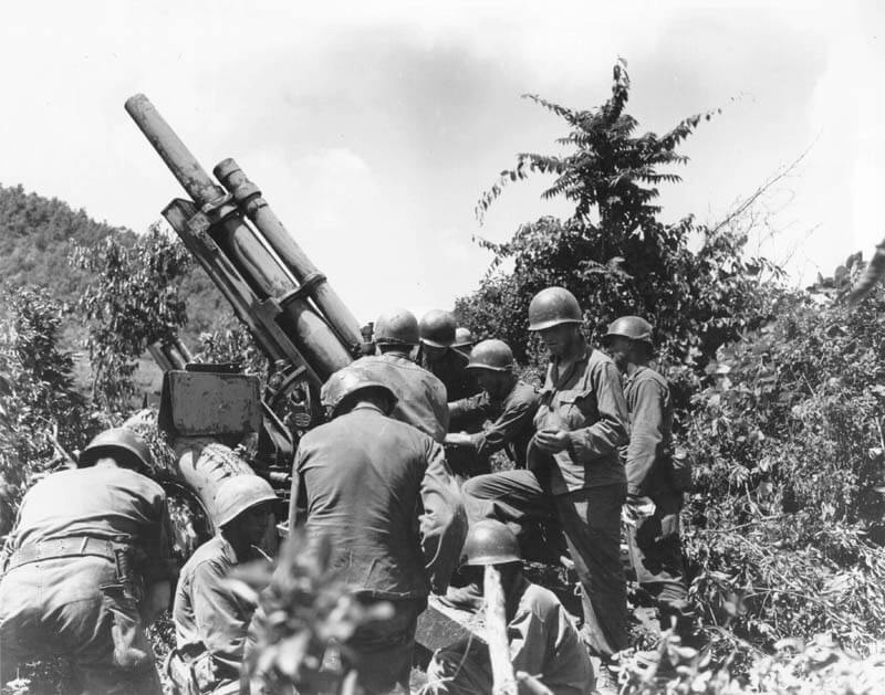 Soldier preparing artillery for the Korean War